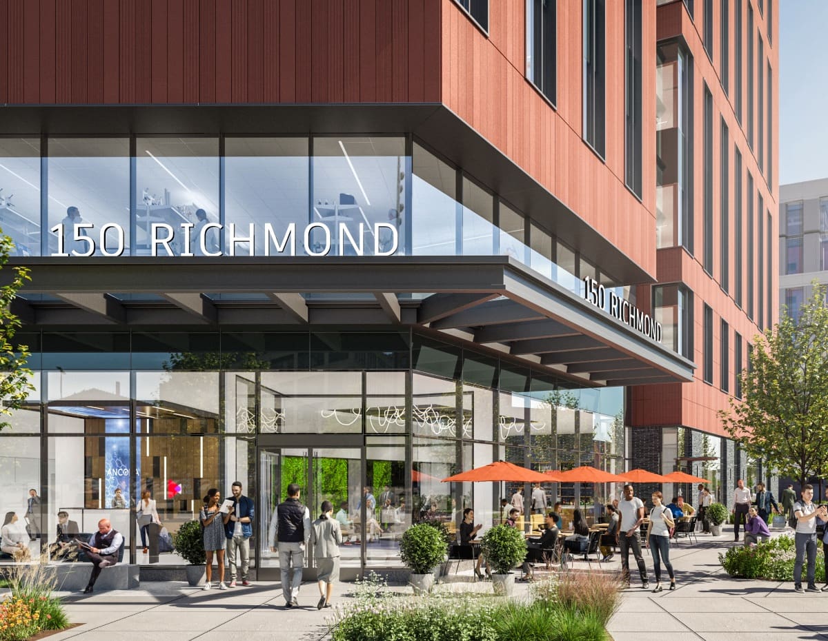 Office building entrance with people around