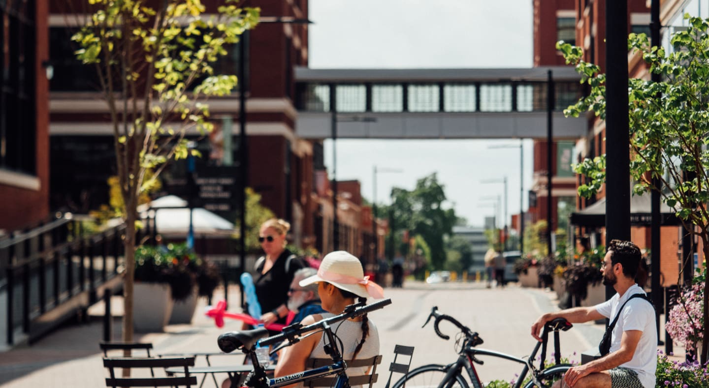 Urban street with cyclists and walkers